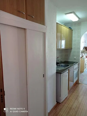 Kitchen; kitchen appliances, tile floor