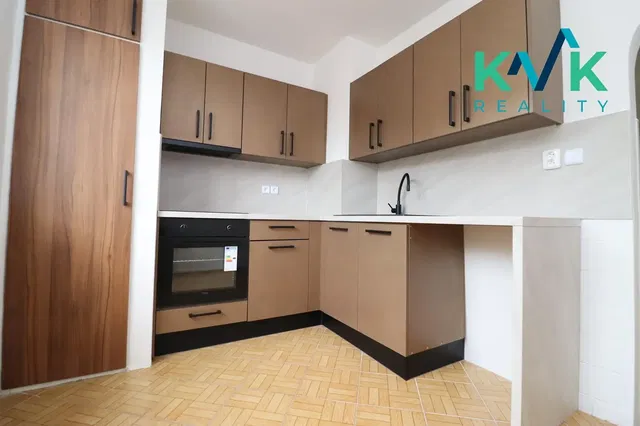 Kitchen; kitchen appliances, tile floor, renovated, natural light, modern style