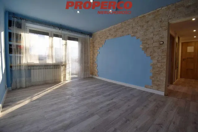 Living room; natural light, wood floor, renovated