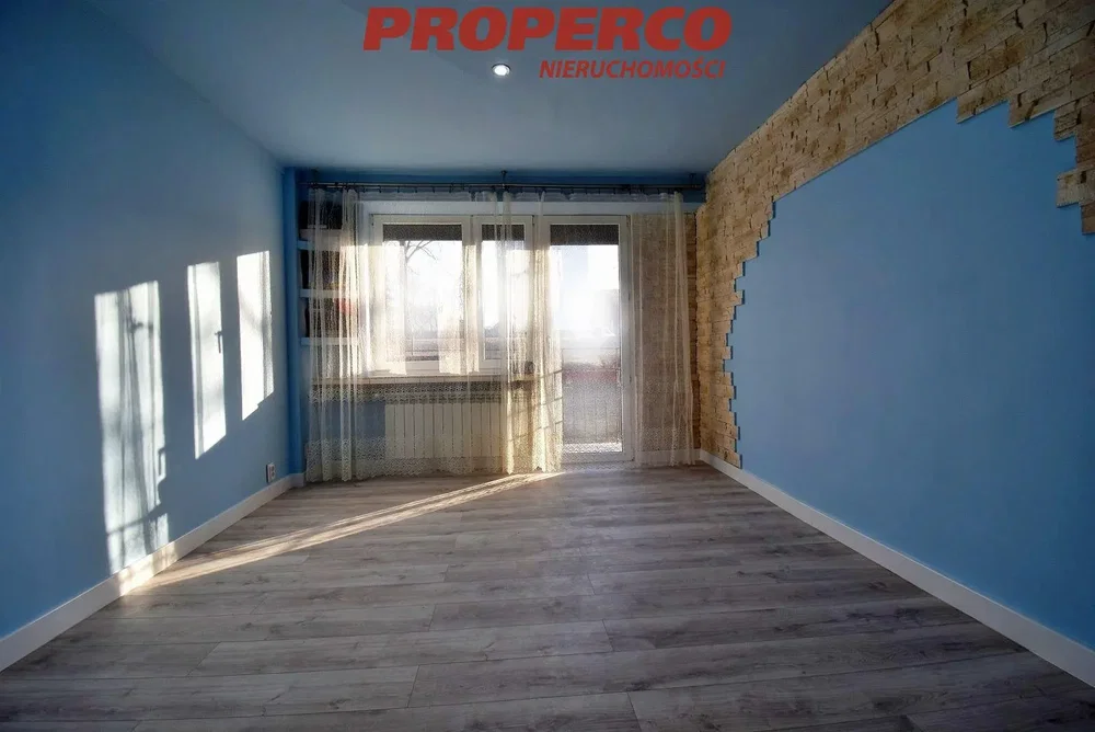 Living room; natural light, wood floor, renovated