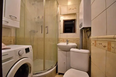 Toilet; tile floor, water heater, needs renovation