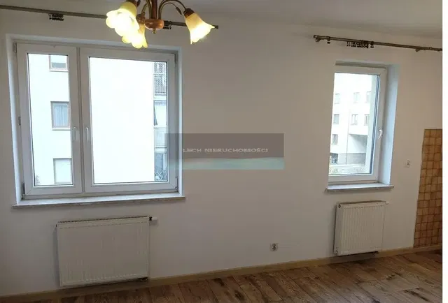 Salon; vue, parquet, lumière naturelle