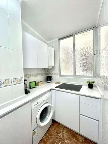 Kitchen; tile floor, natural light, renovated