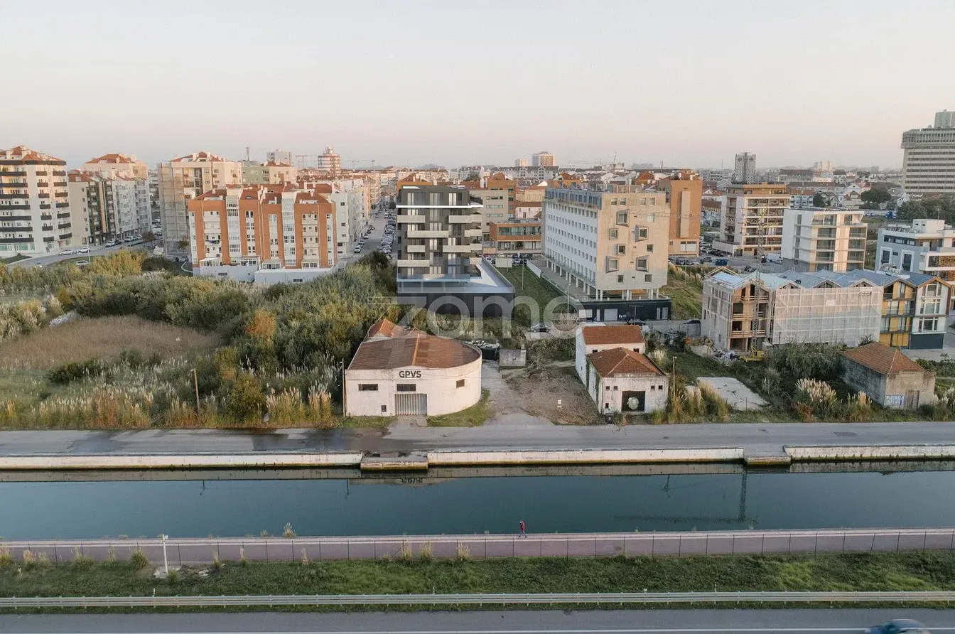 House and surroundings; view