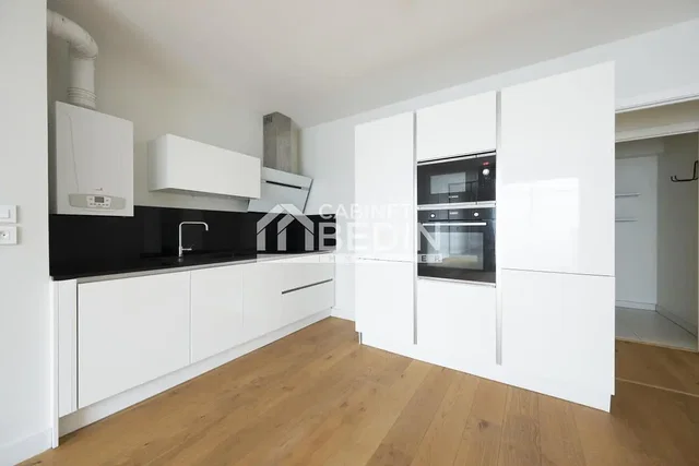 Kitchen; kitchen appliances, wood floor, renovated, natural light