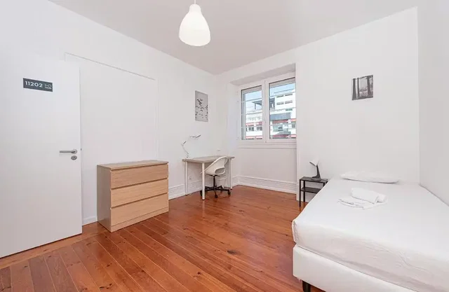 Bedroom; wood floor, natural light