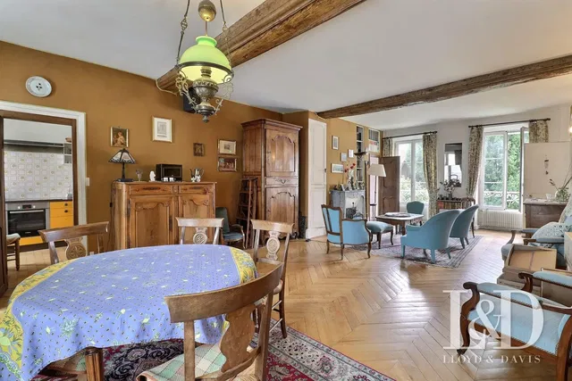 Living room; wood floor, wood beams, rustic style, natural light