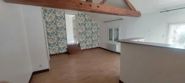 Living room; natural light, wood beams
