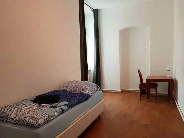 Bedroom; natural light, wood floor