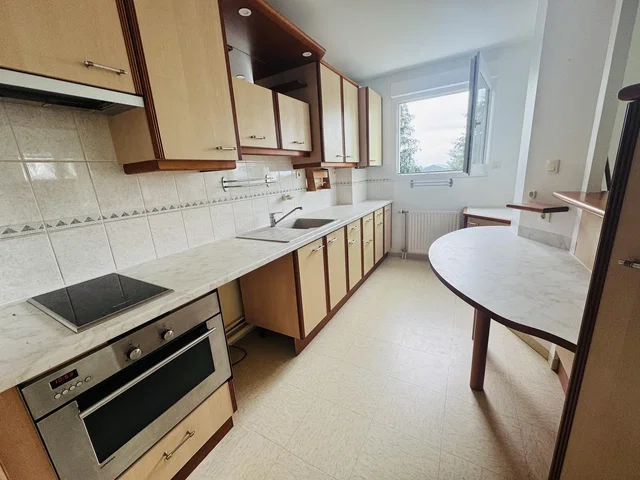 Kitchen; kitchen appliances, tile floor, natural light
