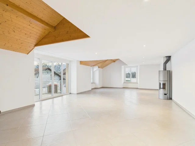Living room; tile floor, fireplace, wood beams, natural light, modern style