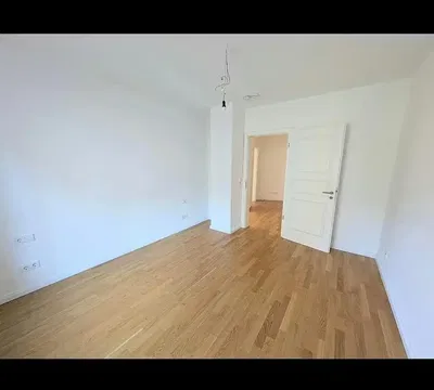 Bedroom; wood floor, natural light