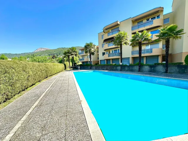 House and surroundings; view