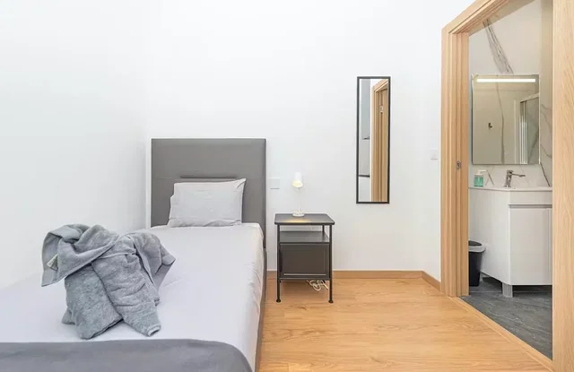 Bedroom; natural light, wood floor, renovated