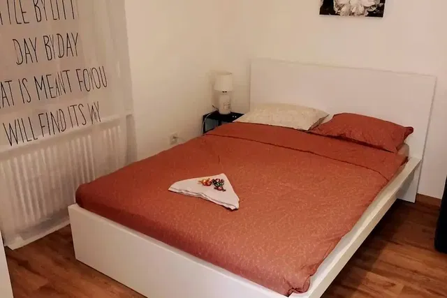 Bedroom; wood floor, natural light