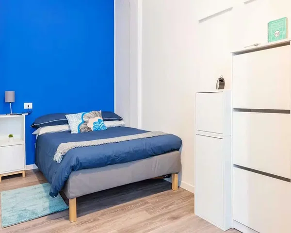 Bedroom; wood floor, natural light