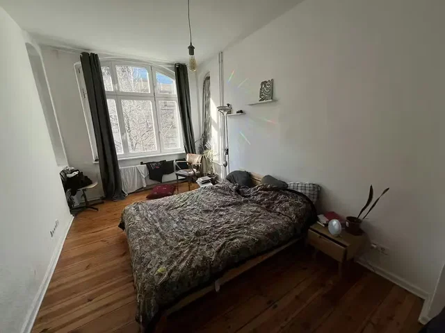 Bedroom; wood floor, natural light
