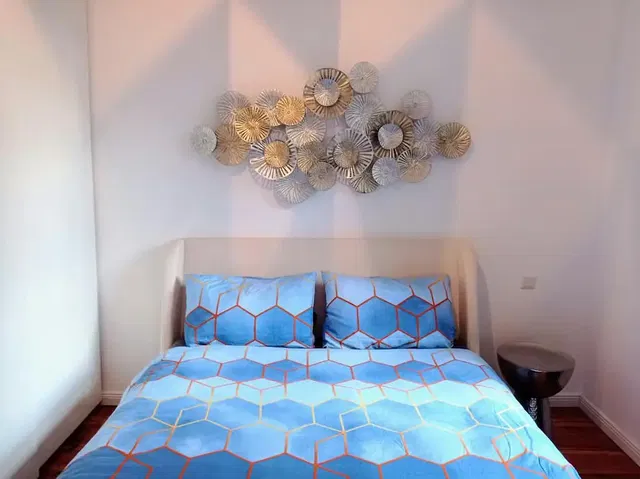 Bedroom; modern style, wood floor, natural light