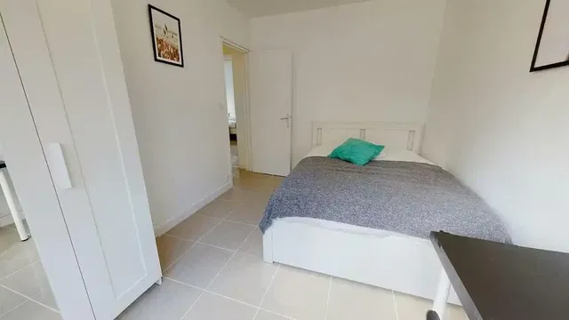 Bedroom; tile floor, natural light
