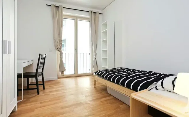 Bedroom; natural light, wood floor