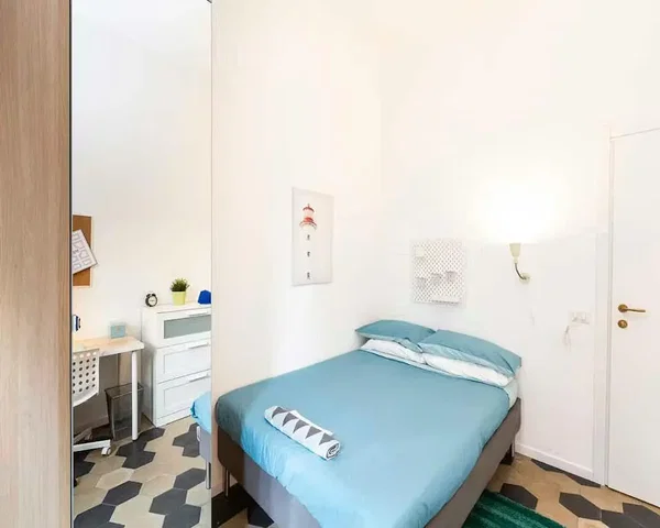 Bedroom; natural light, tile floor