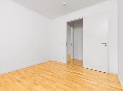 Bedroom; wood floor, natural light