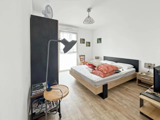 Bedroom; natural light, tile floor