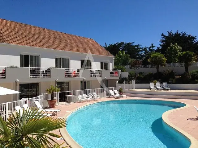 House and surroundings; view