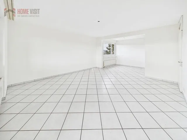 Living room; tile floor, natural light, renovated