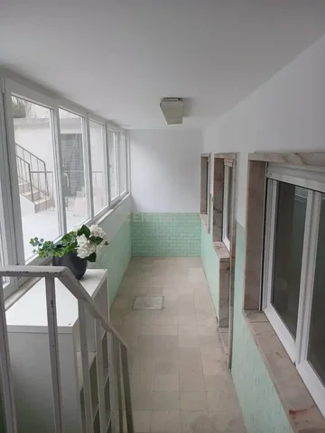 Balcony; natural light, tile floor, view