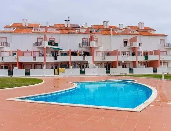 House and surroundings; view