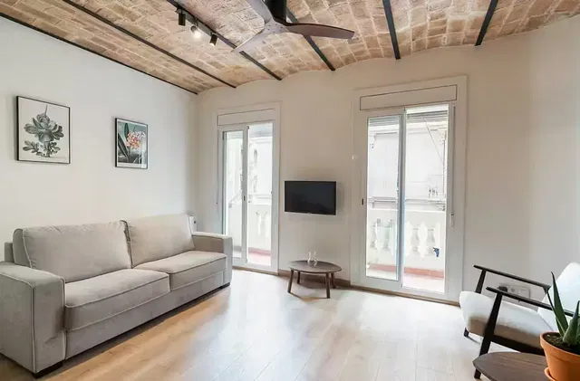 Living room; natural light, wood floor, modern style