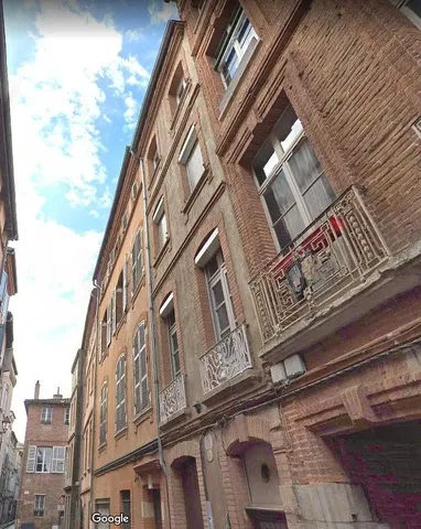 House and surroundings; view