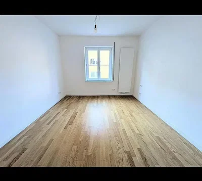 Bedroom; wood floor, natural light