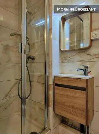 Bathroom; tile floor, renovated, natural light, modern style