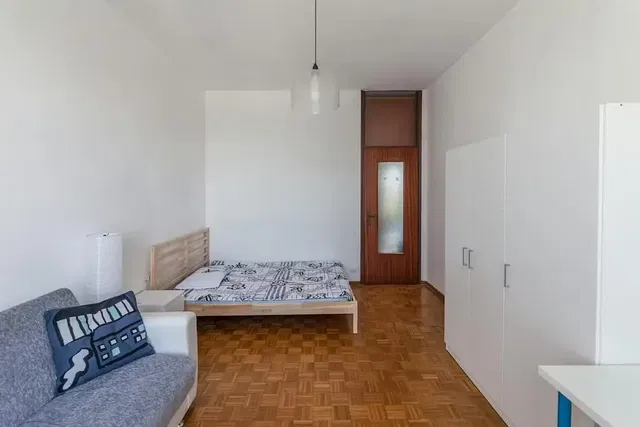 Bedroom; natural light, wood floor