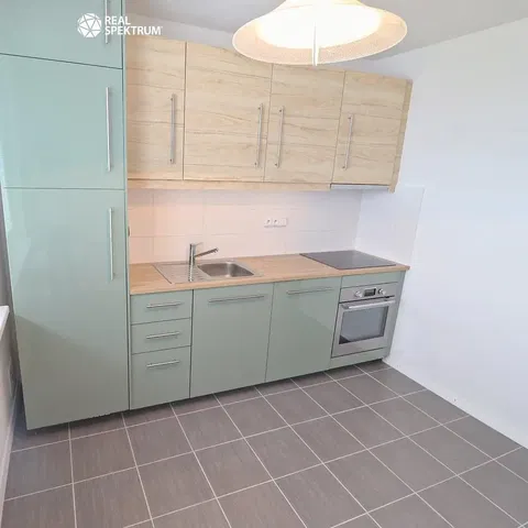 Kitchen; kitchen appliances, tile floor, renovated, natural light