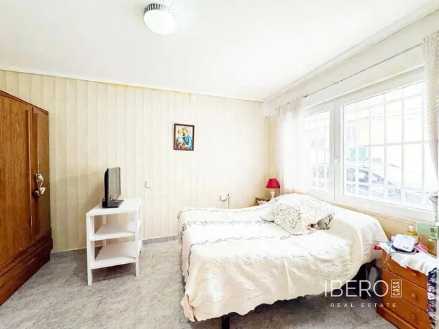 Bedroom; natural light, tile floor