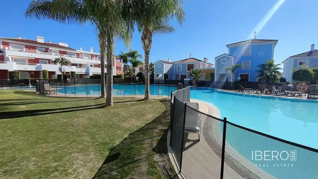 House and surroundings; view