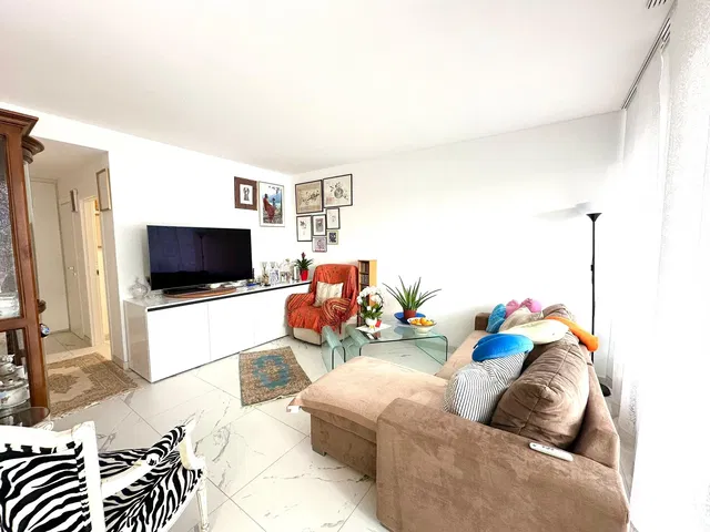 Living room; tile floor, natural light, modern style