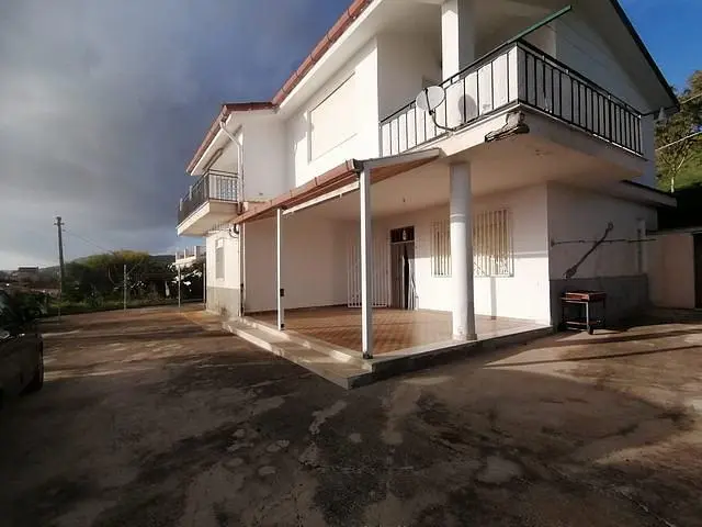 House and surroundings