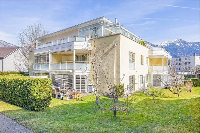 House and surroundings; view