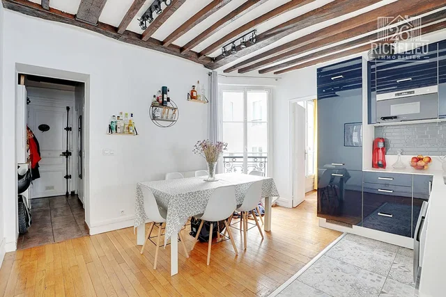 Dining room; wood beams, wood floor, natural light, modern style
