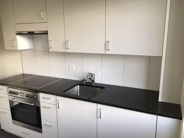 Kitchen; kitchen appliances, tile floor, renovated, natural light