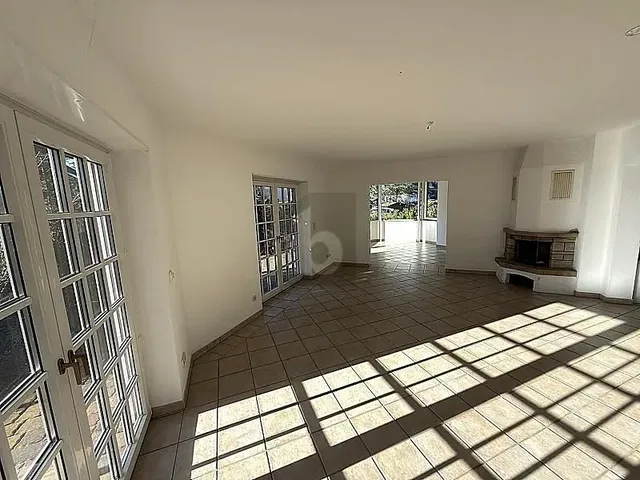 Living room; natural light, tile floor, fireplace