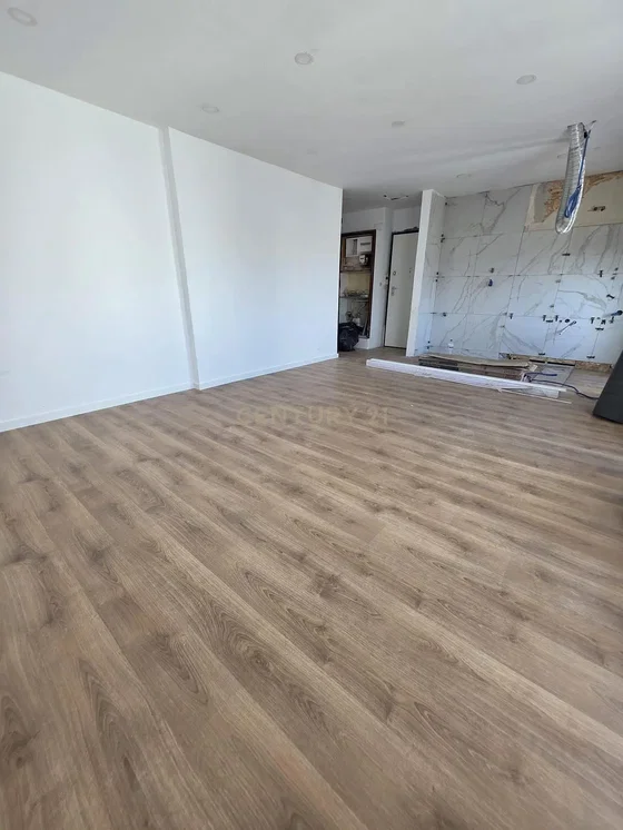 Living room; wood floor, renovated, natural light