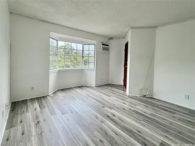 Living room; view, tile floor, natural light, renovated