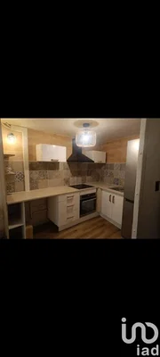 Kitchen; kitchen appliances, tile floor, wood floor