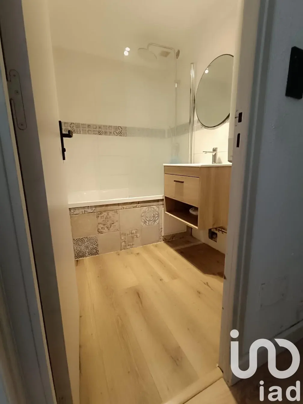 Bathroom; tile floor, renovated, natural light, modern style