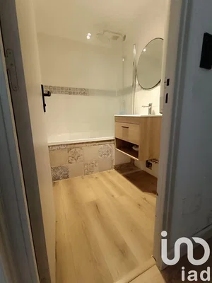 Bathroom; tile floor, renovated, natural light, modern style